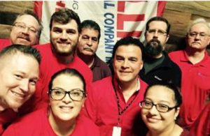 Corporate Estimating Dept. Front. Dustin, Nabieha, Araceli. Back. Dave, Cameron, Rick G, Adam, Hans.
